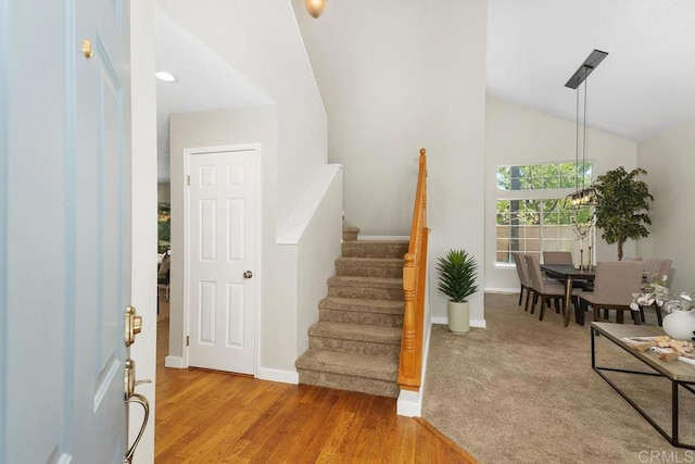 32175 Via Flore, Temecula, CA 92592 - foyer featuring stairway, wood finished floors, and high vaulted ceiling