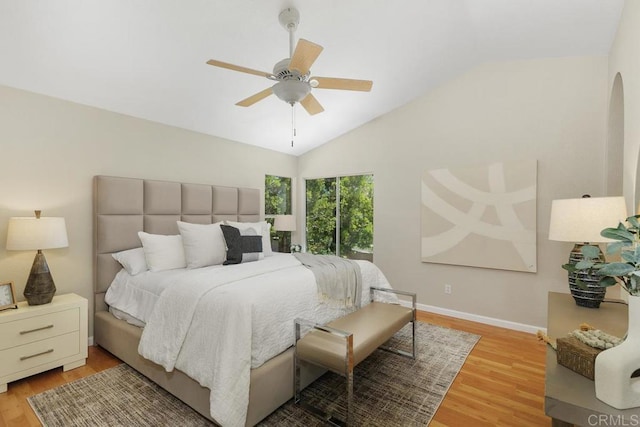 32175 Via Flore, Temecula, CA 92592 - bedroom with light wood finished floors, lofted ceiling, and a ceiling fan