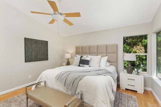 32175 Via Flore, Temecula, CA 92592 - bedroom with light wood-type flooring, vaulted ceiling, and a ceiling fan