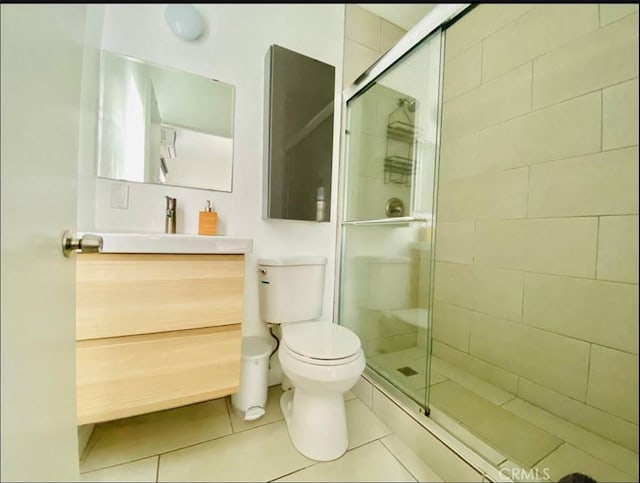 3119 Larga Ave, Los Angeles, CA 90039 - full bath with vanity, a stall shower, toilet, and tile patterned floors