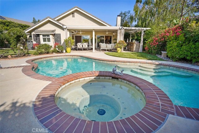 6617 Oak Forest Dr, Oak Park, CA 91377 - view of pool featuring ceiling fan, a patio area, and a pool with connected hot tub