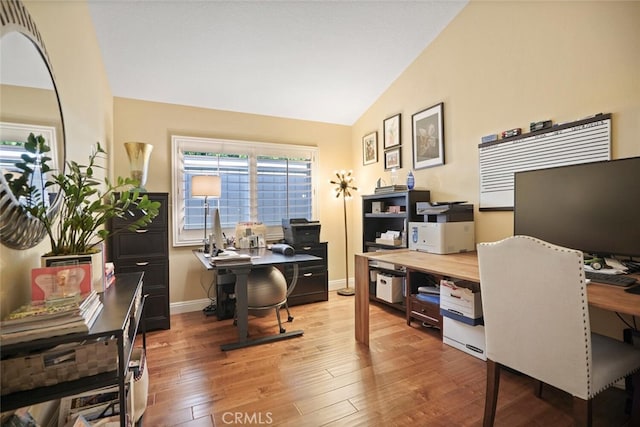 6617 Oak Forest Dr, Oak Park, CA 91377 - home office featuring lofted ceiling, wood finished floors, and baseboards