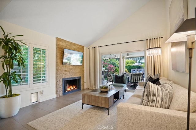 6617 Oak Forest Dr, Oak Park, CA 91377 - living area with wood finished floors, high vaulted ceiling, a fireplace, and baseboards
