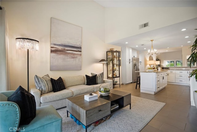 6617 Oak Forest Dr, Oak Park, CA 91377 - living area with a chandelier, recessed lighting, and light tile patterned flooring