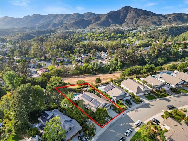 6617 Oak Forest Dr, Oak Park, CA 91377 - aerial perspective of suburban area featuring mountains and property parcel outlined