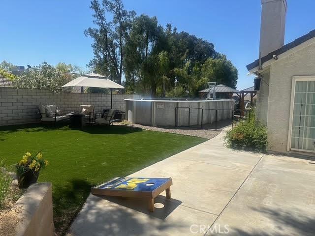 11420 Lasselle St, Moreno Valley, CA 92557 - view of yard featuring a patio area