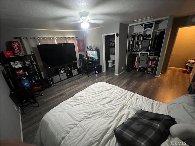 11420 Lasselle St, Moreno Valley, CA 92557 - bedroom featuring wood finished floors, a textured ceiling, a closet, and a ceiling fan