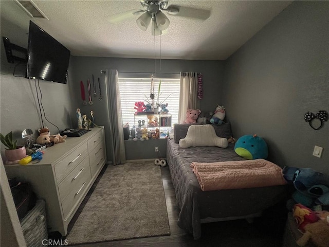 11420 Lasselle St, Moreno Valley, CA 92557 - bedroom with a textured ceiling, a ceiling fan, and carpet floors