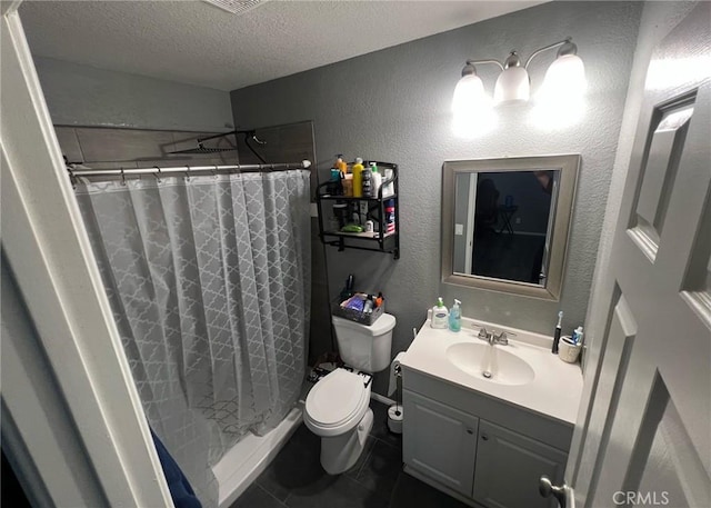 11420 Lasselle St, Moreno Valley, CA 92557 - bathroom featuring toilet, vanity, a textured ceiling, curtained shower, and tile patterned floors