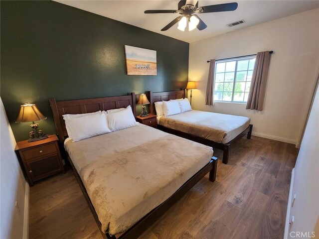 43620 Brahea Ct, Indio, CA 92201 - bedroom with wood finished floors, baseboards, and a ceiling fan