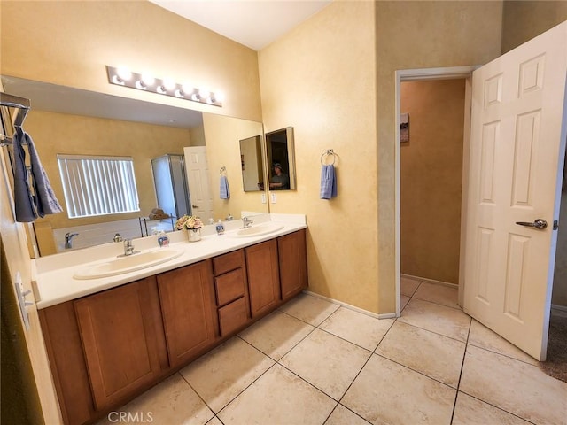 43620 Brahea Ct, Indio, CA 92201 - bathroom with tile patterned flooring, double vanity, and baseboards