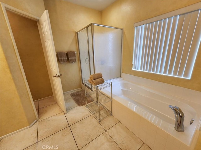 43620 Brahea Ct, Indio, CA 92201 - full bathroom featuring a garden tub, a shower stall, and tile patterned floors