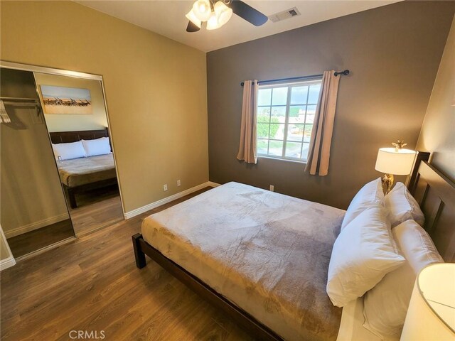 43620 Brahea Ct, Indio, CA 92201 - bedroom with wood finished floors, baseboards, and a ceiling fan
