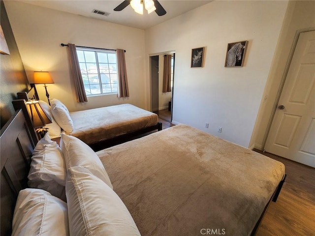 43620 Brahea Ct, Indio, CA 92201 - bedroom with dark wood-type flooring and a ceiling fan