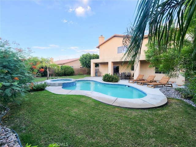 43620 Brahea Ct, Indio, CA 92201 - view of swimming pool with a patio area and a pool with connected hot tub