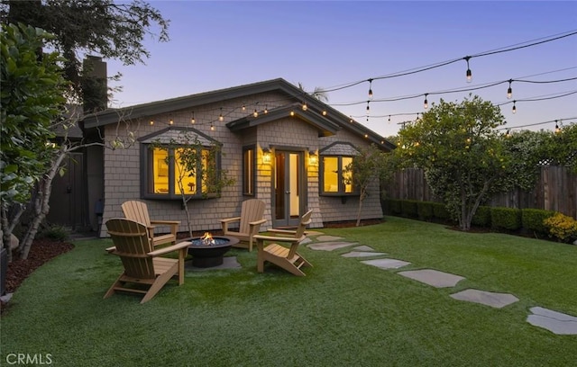 929 Lake St, Venice, CA 90291 - back of property at dusk featuring an outdoor fire pit