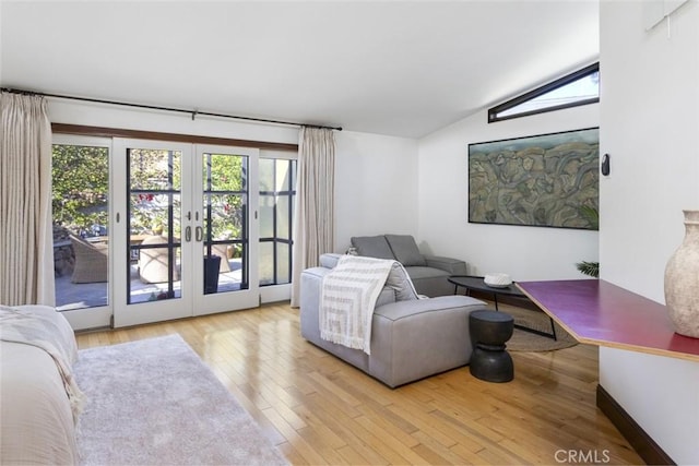 929 Lake St, Venice, CA 90291 - living room featuring french doors, lofted ceiling, and wood finished floors