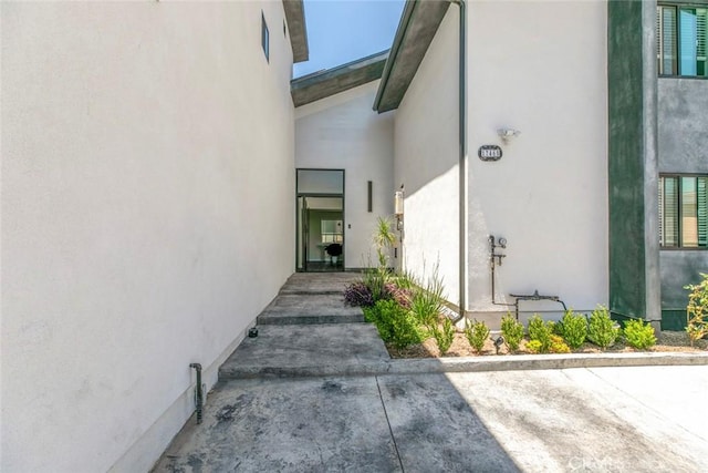 17465 Tuscan Dr, Granada Hills, CA 91344 - doorway to property featuring stucco siding