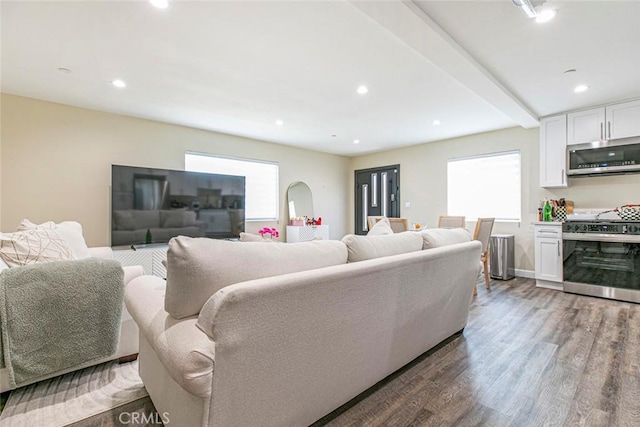 17465 Tuscan Dr, Granada Hills, CA 91344 - living room featuring healthy amount of natural light, wood finished floors, and recessed lighting