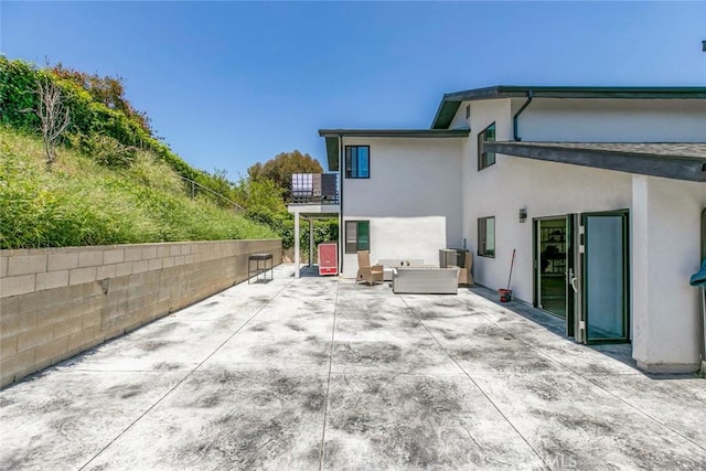 17465 Tuscan Dr, Granada Hills, CA 91344 - fenced backyard with a patio, an outdoor living space, and a balcony