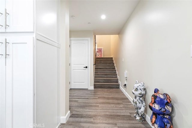 17465 Tuscan Dr, Granada Hills, CA 91344 - stairs featuring baseboards, wood finished floors, and recessed lighting