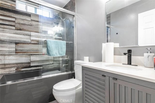 17465 Tuscan Dr, Granada Hills, CA 91344 - bathroom with toilet, shower / bath combination with glass door, and vanity