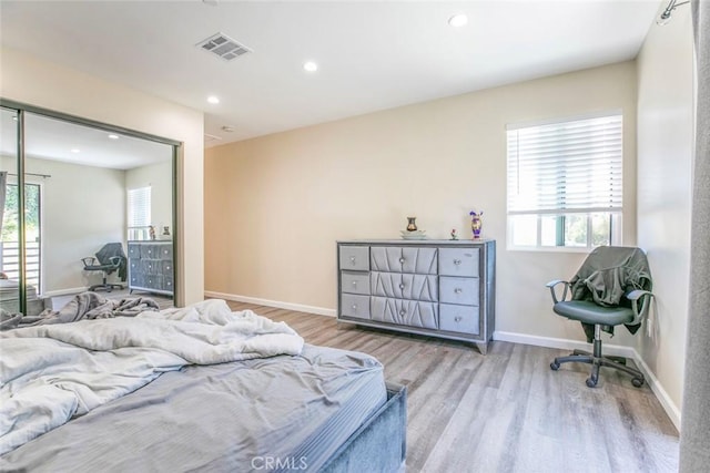 17465 Tuscan Dr, Granada Hills, CA 91344 - bedroom with wood finished floors, recessed lighting, baseboards, and a closet