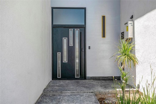 17465 Tuscan Dr, Granada Hills, CA 91344 - entrance to property with elevator and stucco siding