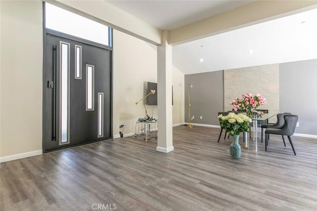 17465 Tuscan Dr, Granada Hills, CA 91344 - entryway with baseboards, wood finished floors, and vaulted ceiling