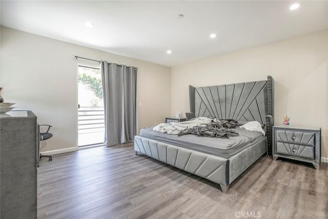 17465 Tuscan Dr, Granada Hills, CA 91344 - bedroom with wood finished floors, access to exterior, baseboards, and recessed lighting