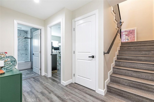17465 Tuscan Dr, Granada Hills, CA 91344 - staircase with wood finished floors and baseboards