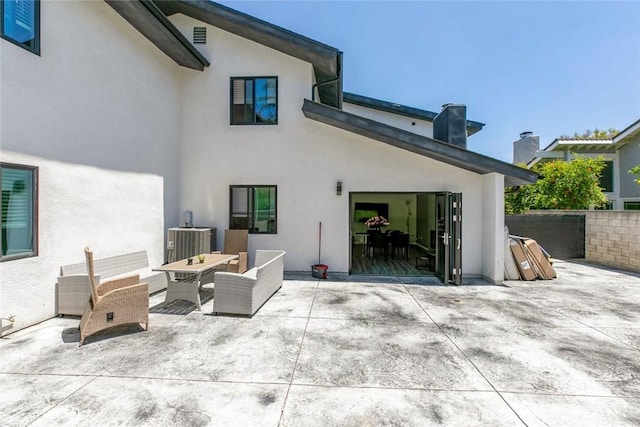 17465 Tuscan Dr, Granada Hills, CA 91344 - rear view of house featuring a patio area, cooling unit, and stucco siding