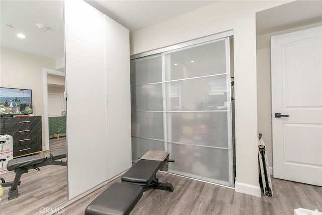 17465 Tuscan Dr, Granada Hills, CA 91344 - exercise area with wood finished floors and recessed lighting