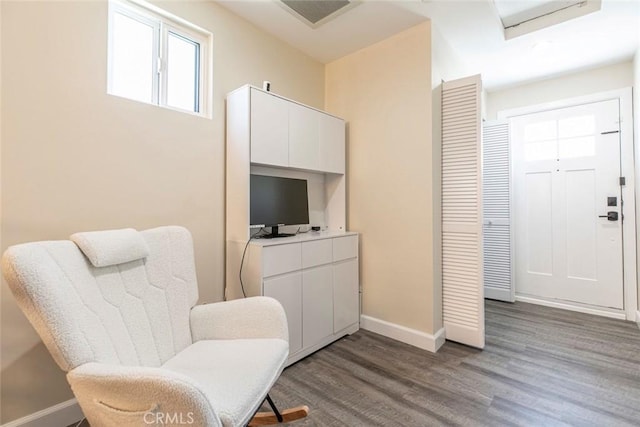 17465 Tuscan Dr, Granada Hills, CA 91344 - sitting room with plenty of natural light, baseboards, and dark wood finished floors