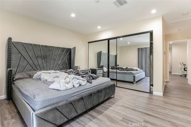 17465 Tuscan Dr, Granada Hills, CA 91344 - bedroom featuring wood finished floors, a closet, recessed lighting, and baseboards