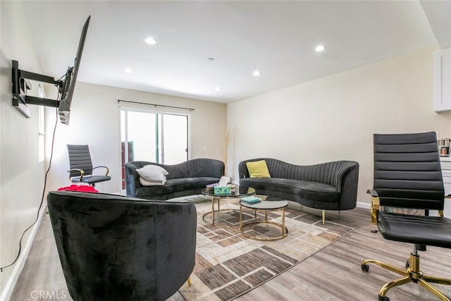 17465 Tuscan Dr, Granada Hills, CA 91344 - living room with wood finished floors, recessed lighting, and baseboards
