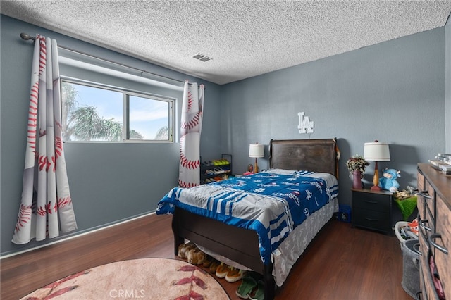 756 W Fontlee Ln, Rialto, CA 92376 - bedroom featuring wood finished floors and a textured ceiling