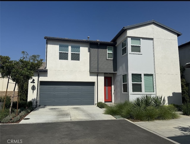 24581 Sonieta Ct, Corona, CA 92883 - view of front facade with concrete driveway, stucco siding, and a garage