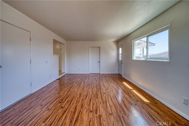 502 Robert Ct, Nipomo, CA 93444 - spare room featuring wood finished floors, baseboards, and a textured ceiling