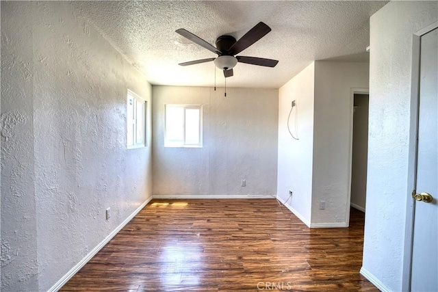 502 Robert Ct, Nipomo, CA 93444 - unfurnished room featuring a textured wall, wood finished floors, a ceiling fan, a textured ceiling, and baseboards