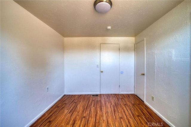 502 Robert Ct, Nipomo, CA 93444 - empty room featuring wood finished floors, baseboards, and a smoke detector
