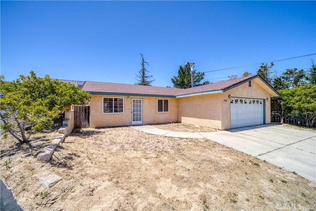 502 Robert Ct, Nipomo, CA 93444 - ranch-style house featuring a garage, stucco siding, and concrete driveway