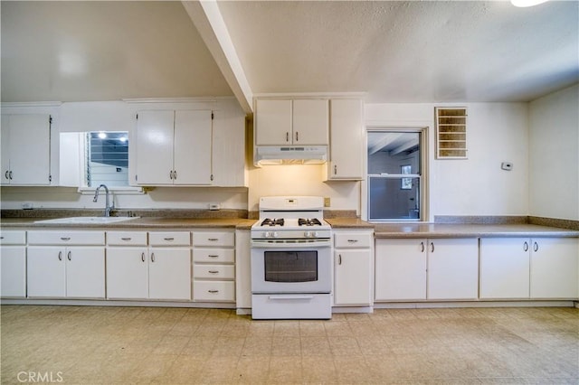 502 Robert Ct, Nipomo, CA 93444 - kitchen with gas range gas stove, under cabinet range hood, a sink, and white cabinets