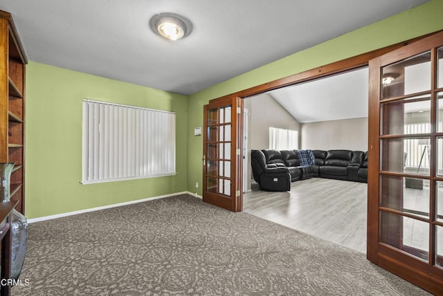 1531 Lakehurst St, Oxnard, CA 93030 - carpeted living room featuring baseboards, french doors, and lofted ceiling