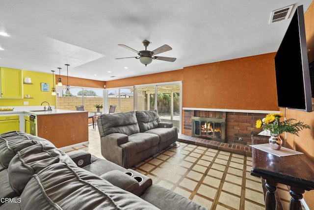 1531 Lakehurst St, Oxnard, CA 93030 - living room with ceiling fan, a fireplace, and recessed lighting