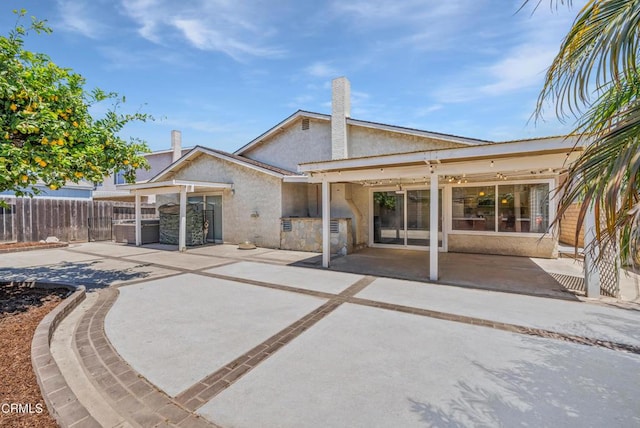 1531 Lakehurst St, Oxnard, CA 93030 - back of house with a patio, stucco siding, and exterior kitchen