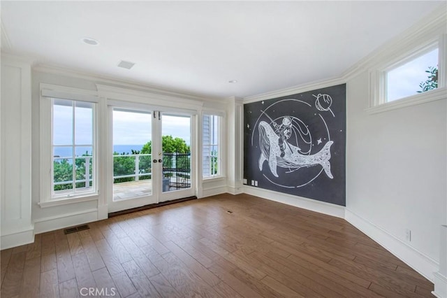 2163 Crestview Dr, Laguna Beach, CA 92651 - unfurnished room with ornamental molding, wood finished floors, and baseboards