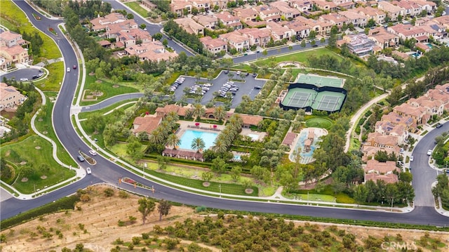 59 Longchamp, Irvine, CA 92602 - aerial view of property's location with nearby suburban area and a pool area
