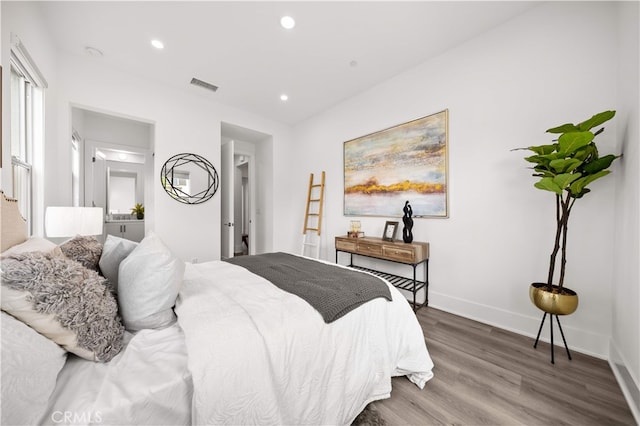 59 Longchamp, Irvine, CA 92602 - bedroom with wood finished floors, recessed lighting, and baseboards