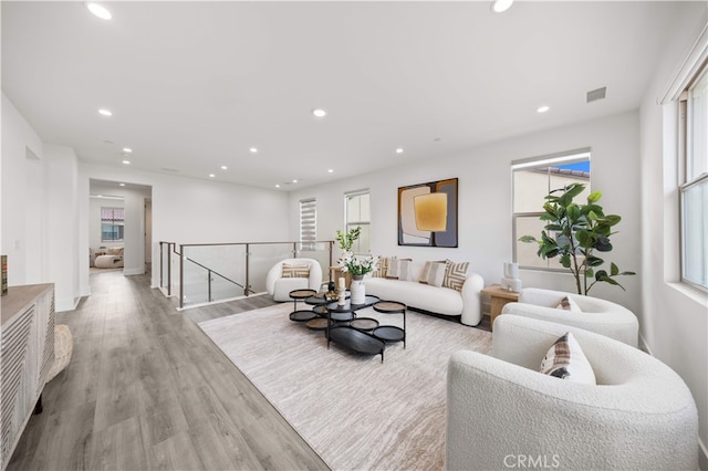 59 Longchamp, Irvine, CA 92602 - living area with recessed lighting, wood finished floors, and healthy amount of natural light